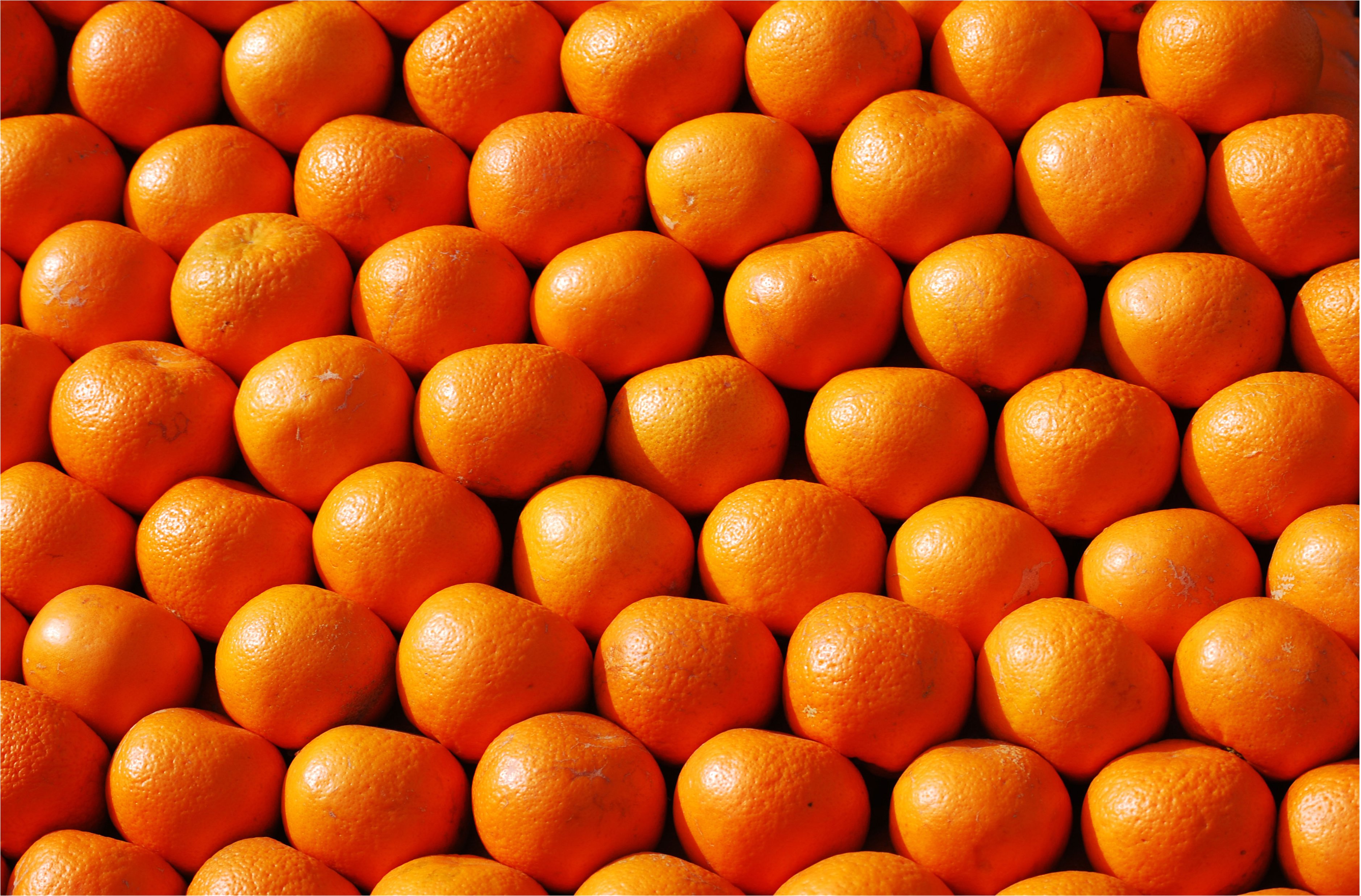 Море мандаринов. Апельсин. Апельсины много. Фон из апельсинов. Куча апельсинов.